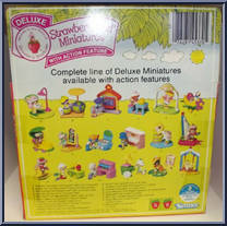 Strawberry Shortcake (with Custard Reading in a Rocking Chair) from Strawberryland Miniatures - Deluxe manufactured by Kenner [Back]